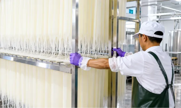 Food processing line in a temperature controlled room